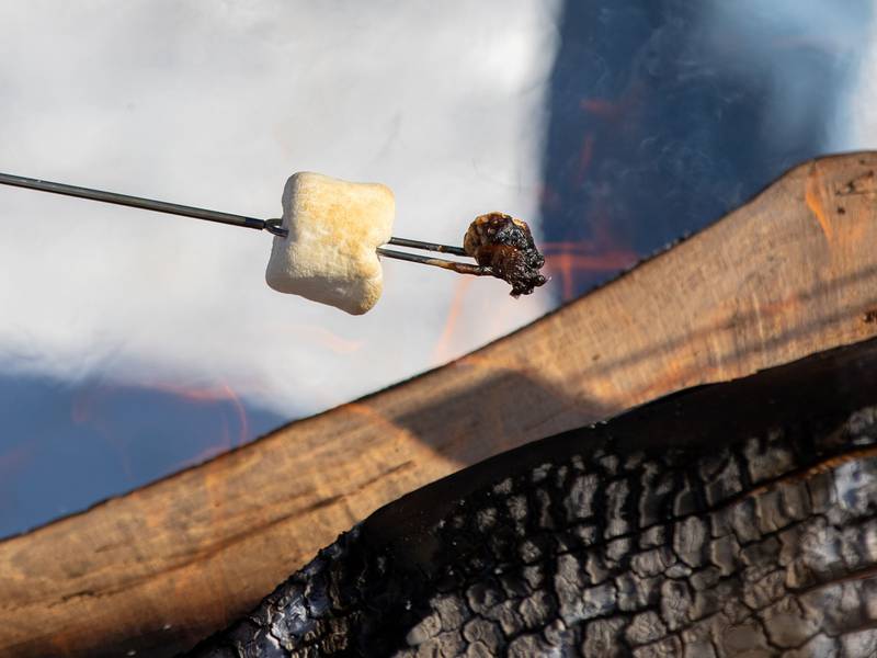 Attendees roasted marshmallows for S’mores during the Wheaton Park District's Ice-A-Palooza at the Central Athletic Complex  in Wheaton on Saturday, Feb. 4, 2023.