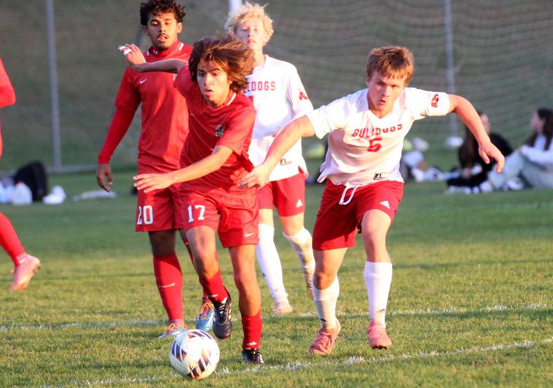 L-P's Jamie Gonzalez kicks the ball away from Streator's Paxton Throp during the Class 2A Regional semifinal game on Monday, Oct. 20, 2025 at Ottawa High School.