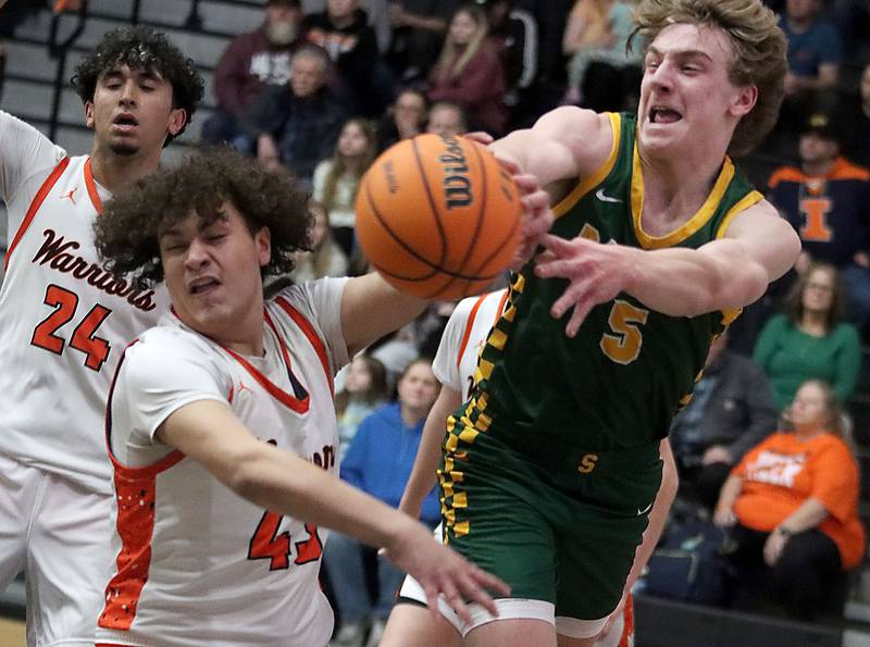 McHenry’s Josiah Kordik, left, guards Crystal Lake South’s Carson Trivellini in varsity boys basketball on Friday, Feb. 20, 2026, at McHenry High School in McHenry.