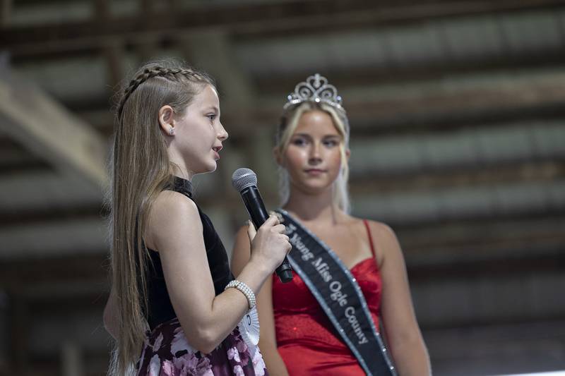 Lauren Hickman, 10, speaks from the stage in the Ogle County Young Miss pageant Thursday, July 30, 2025, at the Ogle County Fairgrounds.