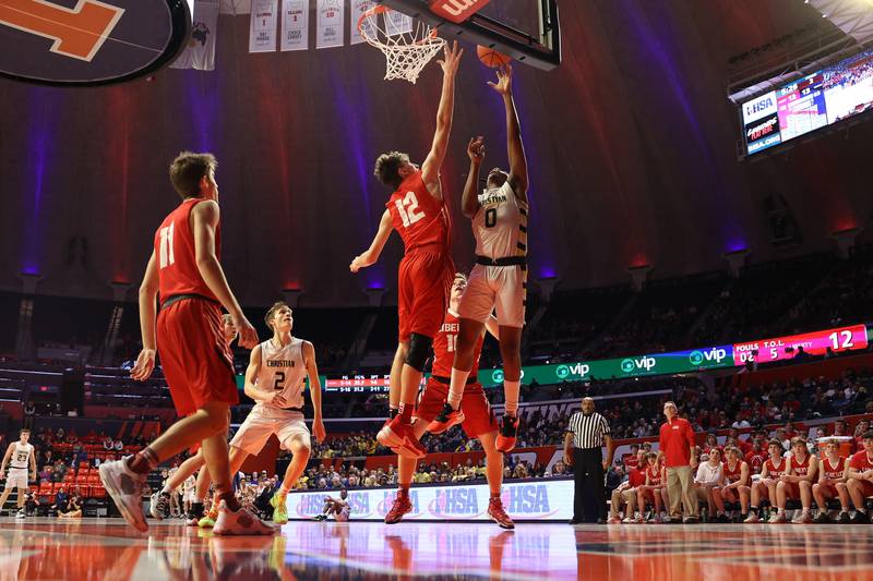 Yorkville Christian’s K.J. Vasser puts up a shot against Liberty in the Class 1A championship game at State Farm Center in Champaign. Friday, Mar. 11, 2022, in Champaign.