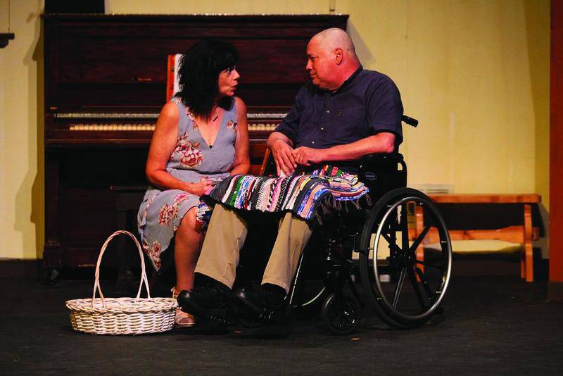 Lynn Sciaraffa (Annie) of Woodstock and Bruce Berger (John Clarke) of Lake in the Hills  rehearse a scene together during the dress rehearsal of "Calendar Girls" at PM&L Theatre in Antioch. The show will run weekends from Sept. 7 to 23.