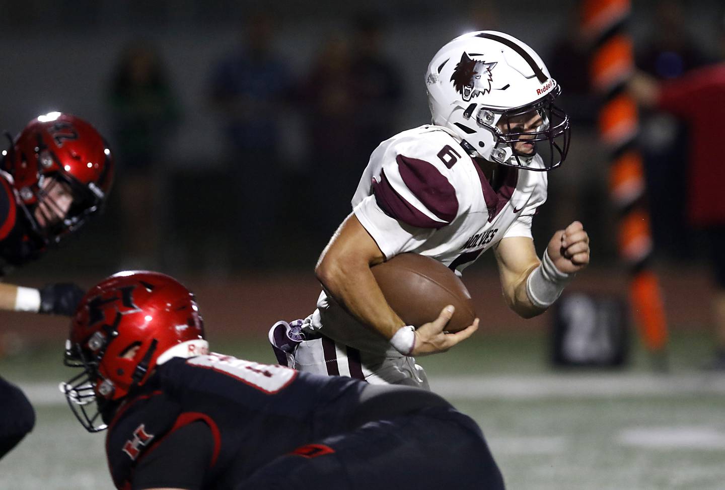Prairie Ridge's Luke Vanderwiel breaks through the Huntley defense to run for a touchdown during a Fox Valley Conference football game on Friday, Oct. 3, 2025, at Huntley High School.