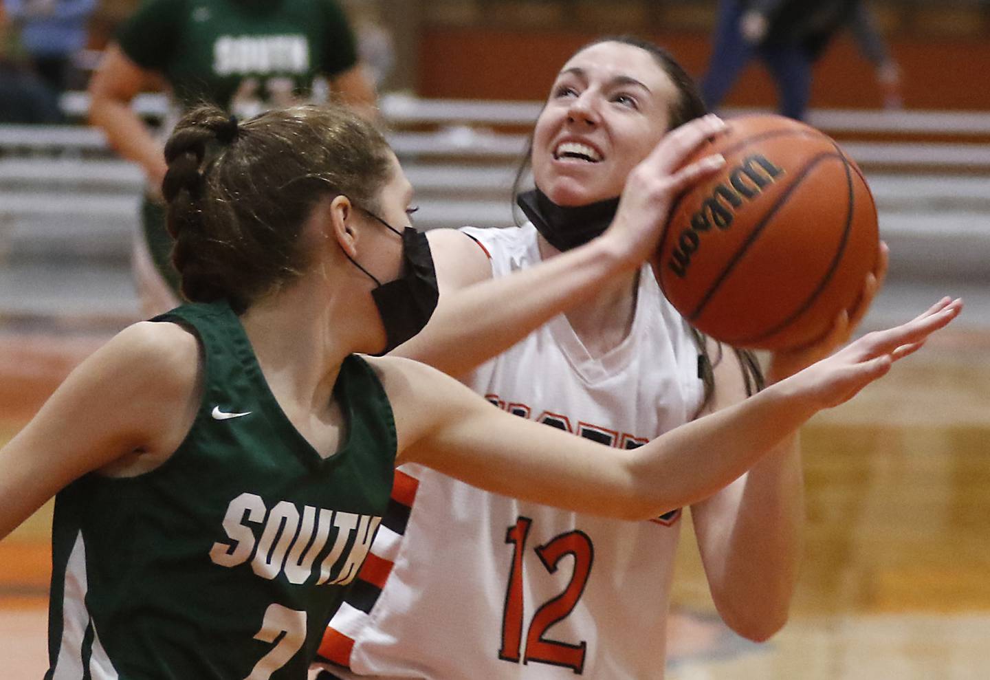 Crystal Lake Central's Paige Keller, right, shoots the ball over Crystal Lake South's Mackenzie Resch during a Fox Valley Conference game Wednesday, Jan. 26, 2022, between Crystal Lake South and Crystal Lake Central at Crystal Lake Central High School.