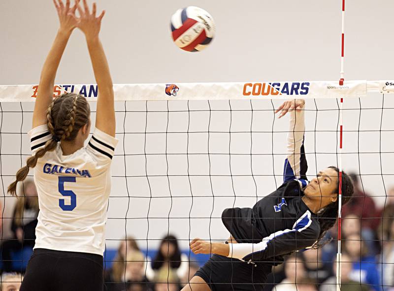 Newwark’s Kiara Wesseh spikes against Galena’s Kendra Bauer Monday, Oct. 30, 2023 at the Eastland 1A volleyball sectional.