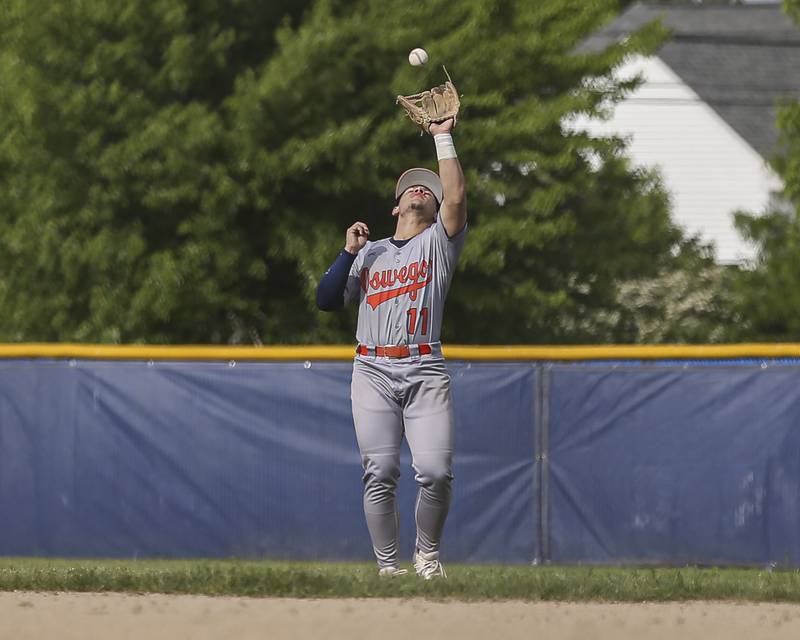 Oswego's Isaiah Logan (11) catches a popup at second during baseball game between Oswego East at Oswego. Monday, May 19, 2025 in Oswego.