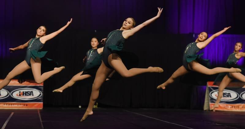 Joe Lewnard/jlewnard@dailyherald.com
Lincoln-Way East performs during the Class 3A Competitive Dance finals at Grossinger Motors Arena in Bloomington Saturday.