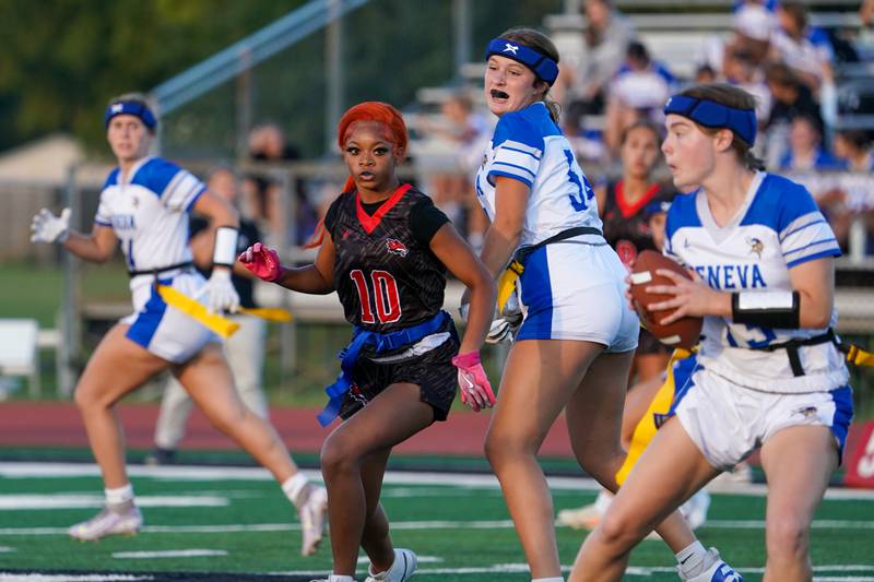 Yorkville's Janilah Smith (10) rushes Geneva’s Linnea Popp (13) during a non-conference game at Yorkville High School on Tuesday, Sept. 2, 2025.
