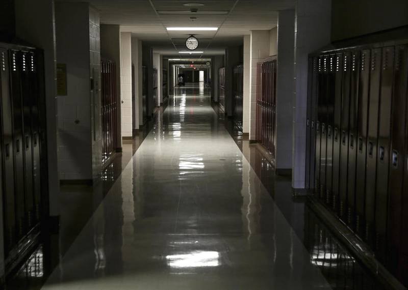 A hallway of lockers sits empty Thursday at Lincoln-Way North High School in Frankfort.