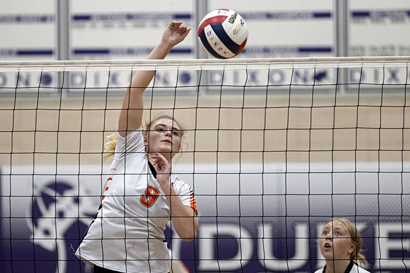 DeKalb’s Isabelle Smith spikes against Dixon Tuesday, Sept. 5, 2023 in a game at Dixon High School.