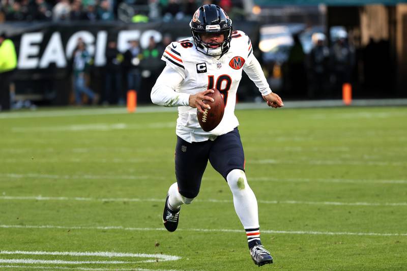 Chicago Bears quarterback Caleb Williams (18) runs with the ball during an NFL football game against the Philadelphia Eagles, Friday, Nov. 28, 2025, in Philadelphia. (AP Photo/Daniel Kucin Jr.)