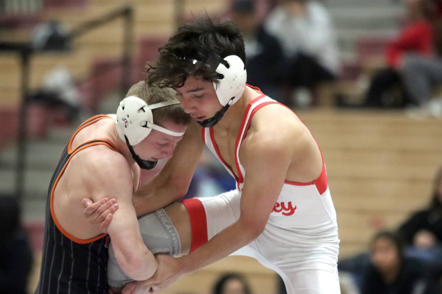 Huntley’s Cameron Abordo, right, battles Crystal Lake Central’s Peyton Ramsey at 120 pounds in varsity wrestling on Friday, Dec. 13, 2024 at Huntley High School in Huntley.