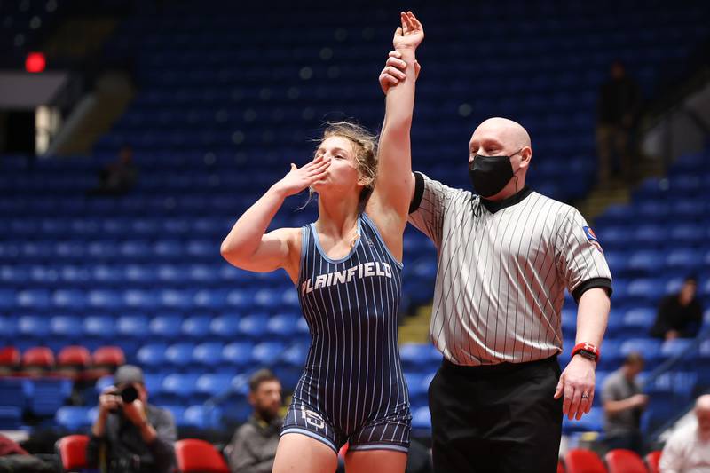 Plainfield South’s Alexis Janiak blows a kiss to family and friends after her 8-1 win over Westville’s Beroin Kiddoo in the 130 pound championship match at Grossinger Motor Arena in Bloomington. Saturday, Feb. 26, 2022, in Champaign.
