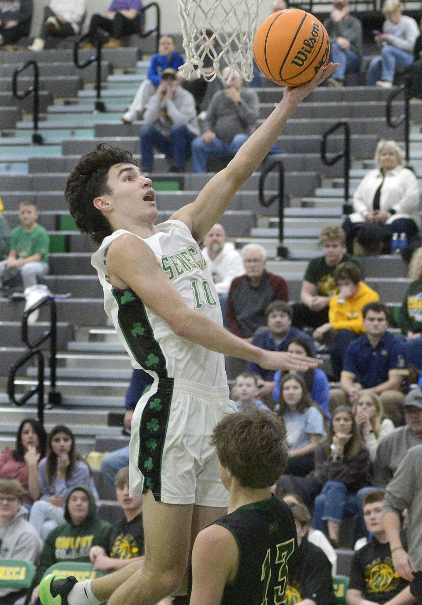 Seneca’s Brayden Simek goes up for a layup over Coal City’s Dane Noffsinger in the 2nd period Friday during the Seneca Shipyard Showdown.