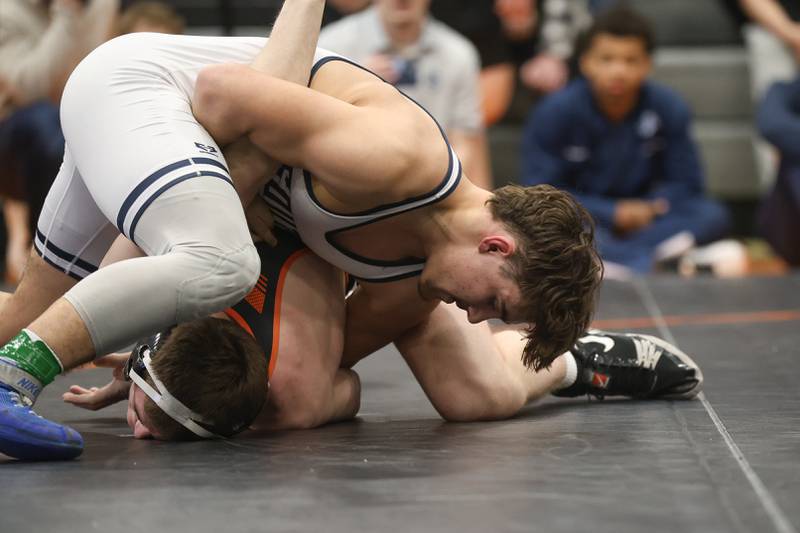 Plainfield South’s Chase Pierceall looks to pin Minooka’s Santino Capodice in the Class 3A Minooka Regional 190 pound championship on Saturday, Jan. 31, 2026 in Minooka.