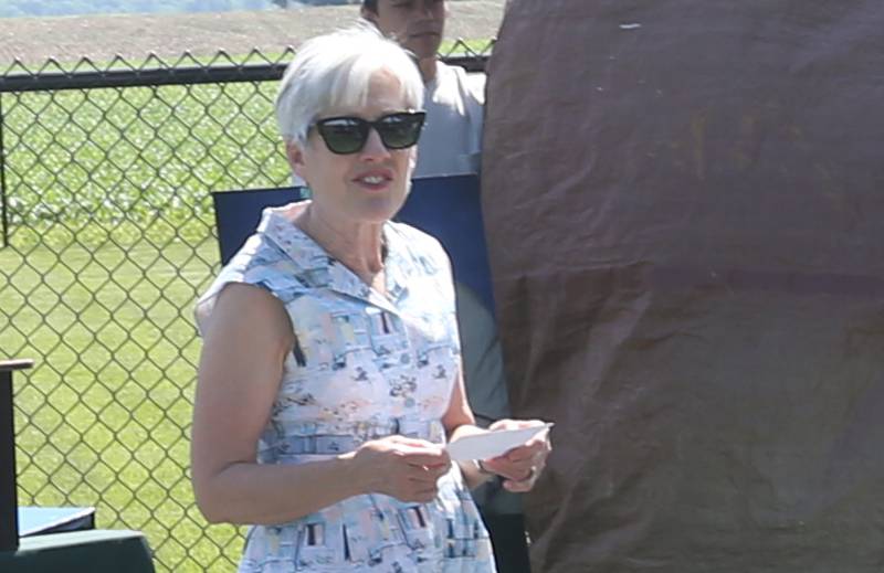 Jan English daughter of Jeanne Hutchinson, delivers a speech during the opening of a new a new dog park on Thursday, May 23, 2024 at Zearing Park in Princeton. The one acre park has duel sections for small and large dogs, benches, a dog water fountain and waste station. Jeanne Hutchinson has donated the funds to the Princeton Park District to fund the building of the dog park and to generate income to help maintain its care.