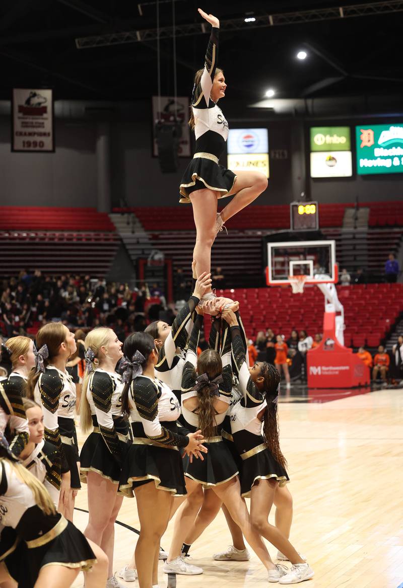 The sycamore cheerleaders perform before the girls game Friday, Jan. 31, 2025, during the FNBO Challenge in the Convocation Center at Northern Illinois University in DeKalb.