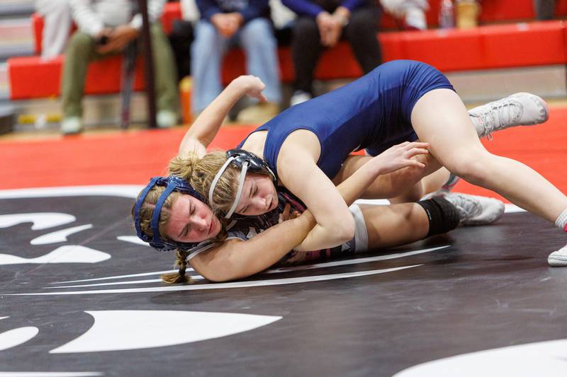 Lincoln Way South's Caleigh and Lisle's Sophie Crescenzo compete in the championship 125 lb class at the East Aurora Wrestling Regional on Saturday, Feb.7,2026 in Aurora.