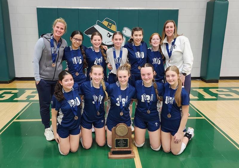 The Trinity Catholic Academy eighth grade volleyball team took third in the IESA Class 1A state tournament over the weekend. Trinity defeated Sigel St. Michael's 25-17, 25-18 in the quarterfinals before losing 20-25, 25-21, 25-13 in the semifinals. Trinity bounced back to beat Rantoul St. Malachy 25-14, 25-15 in the third-place match. Trinity finished the season 23-1.Pictured (front row, from left): Sophia Sarabia, Aubrey Urbanski, Lily Tielebein, Allie Inman and Kaylee Newell. Back row: Coach Laura Urbanski, Alicia Garcia, Brenna Washkowiak, Kylie Kasprak, Sophia Trainor, Avery Torres and assistant Tara Duncan.