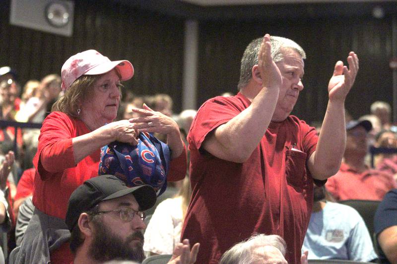 People applaud after their neighbors speak during public participation as the McHenry City Council on Monday, Aug. 7, 2023, addressed a Jack Pease proposal to mine 110 acres at Route 120 and Chapel Hill Road. The meeting was held in McHenry High School’s Upper Campus auditorium.