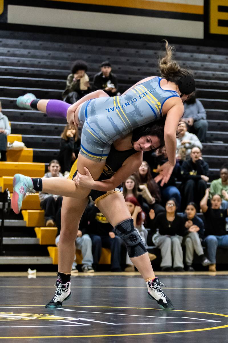 Joliet Central’s Jaylin Ingram and Joliet West’s Vanessa O’Connor and compete in the 145 pound match at Joliet West on Jan. 12, 2026.