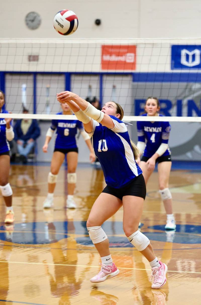 Princeton senior setter Makayla Hecht makes a pass in Thursday's regional championship at Prouty Gym.