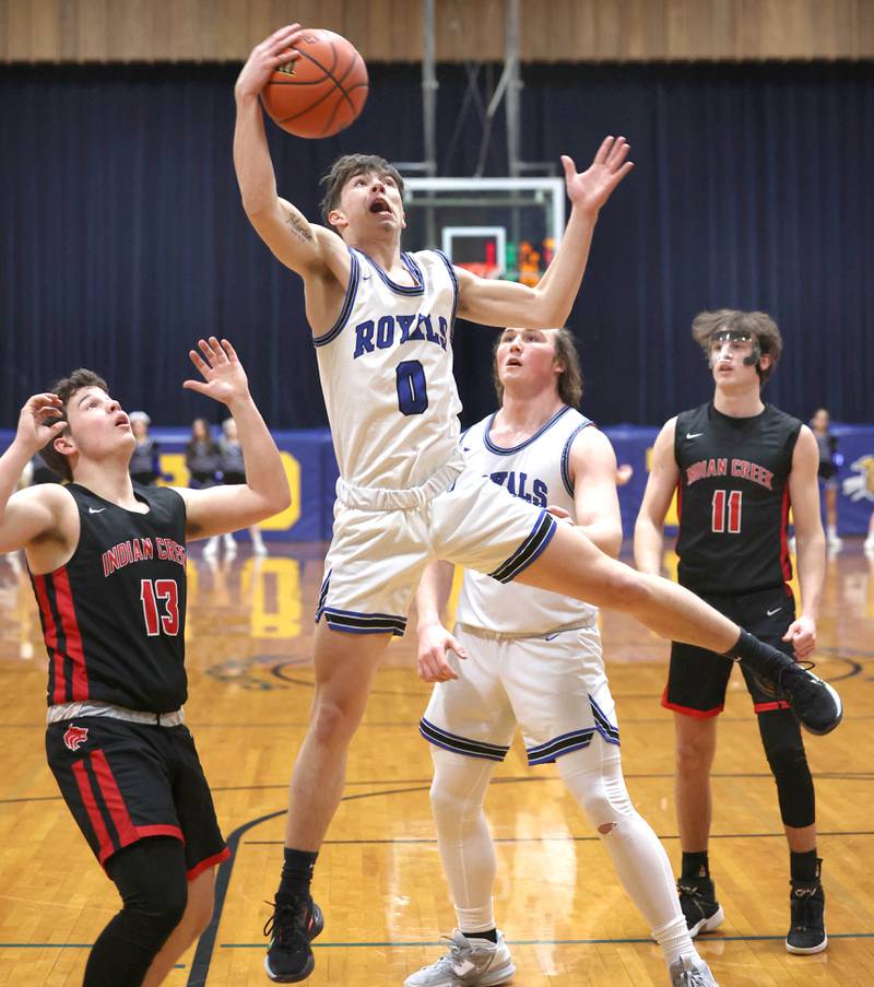 Hinckley-Big Rock's Landon Roop pulls down a rebound in front of Indian Creek's Sam Genslinger during their game Tuesday, Jan. 31, 2023, in the Little 10 Conference Basketball Tournament at Somonauk High School.