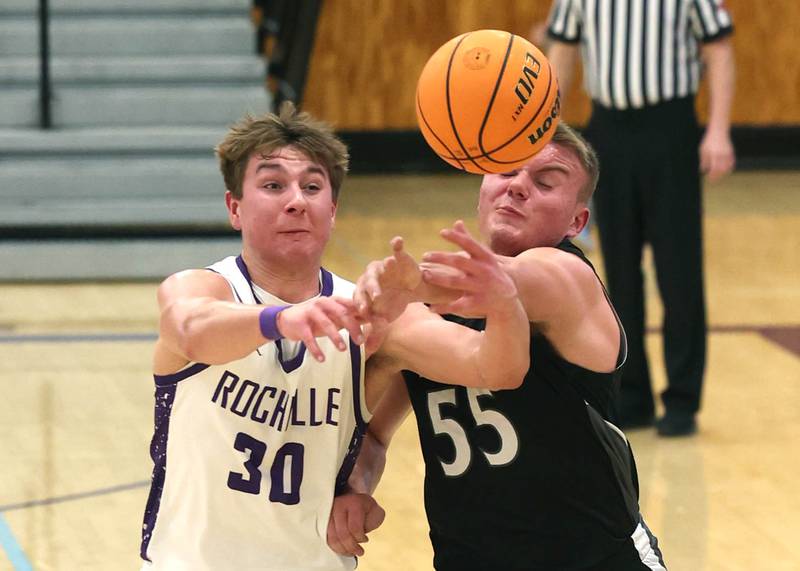 Rochelle's Warren Schwietzer and Kaneland's Jake Buckley go after a loose ball Tuesday, Feb. 3, 2026, in their game at Rochelle High School.