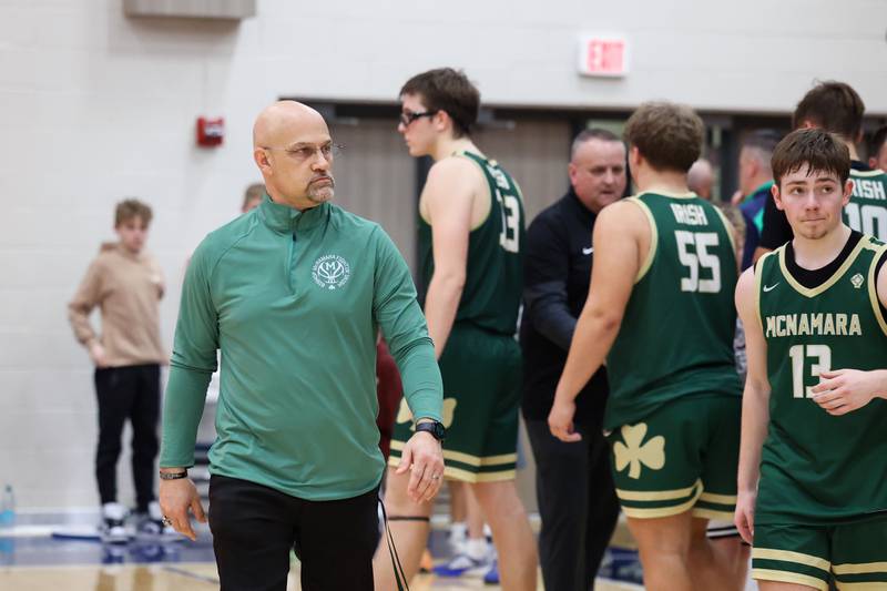 Bishop McNamara head coach Adrian Provost looks out over the fan section following the Fightin' Irish's 77-70 loss to Tolono Unity in the IHSA Class 2A Pontiac Supersectional on Monday, March 9, 2026.