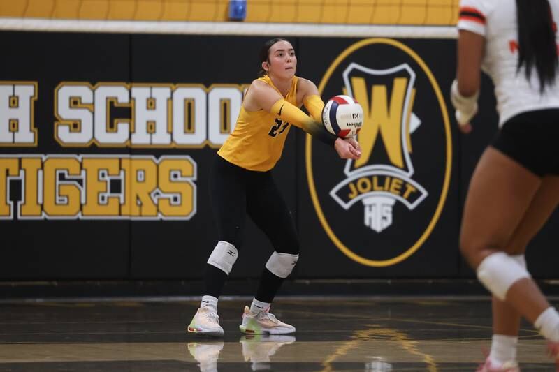 Joliet West’s Olivia Baxter receives a serve against Minooka on Tuesday, Sept. 26, 2023 in Joliet.