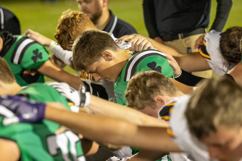 Both players from Seneca and Chicago Christain pray after game on Friday, Aug 29, 2025 at Seneca High School in Seneca.
