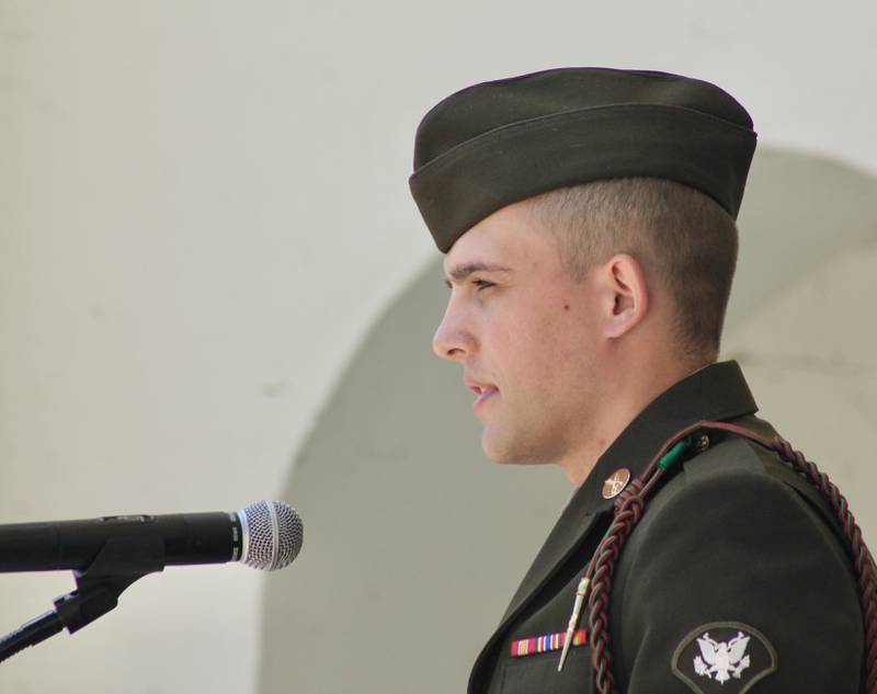 Illinois National Guard Specialist James Hartwig of DeKalb, who is serving with B-Troop 2/106 Calvary in Dixon, serves as the Memorial Day speaker during an observance at Grandon Civic Center in Sterling on May 29, 2023.