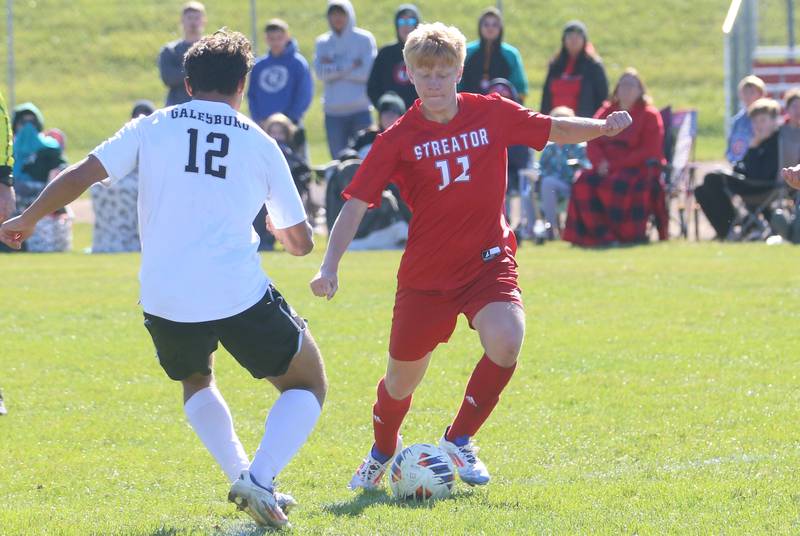 Streator's Connor Decker gets the ball away from Galseburg's Sergey Strunin during the Class 2A Regional final on Saturday, Oct. 26, 2024 at Ottawa High School.