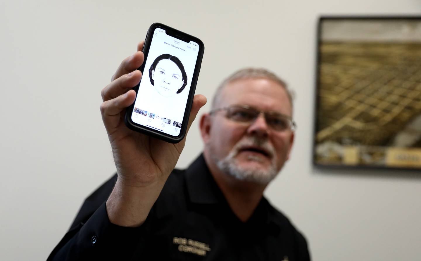 Kane County Coroner Rob Russell shows a rendering of Esther Granger Peck, whose skull was found in the wall of a Batavia home in 1978 during a renovation.