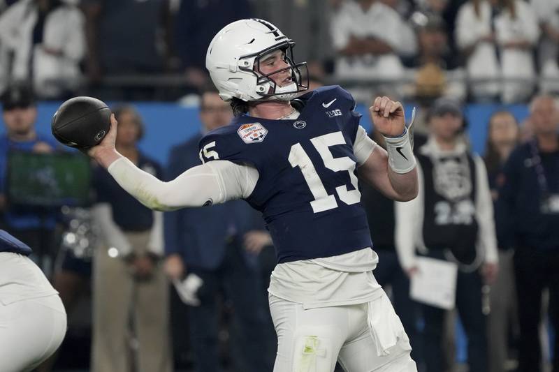 Penn State quarterback Drew Allar (15) throws against Boise State during the first half of the Fiesta Bowl NCAA college football CFP quarterfinal game, Tuesday, Dec. 31, 2024, in Glendale, Ariz. (AP Photo/Rick Scuteri)