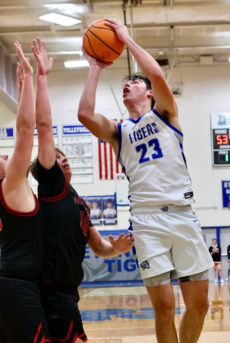 Princeton senior Noah LaPorte powers up for a shot Friday at Prouty Gym. He scored 14 of his. game-high points to lead the Tigers to a 60-37 over Erie-Prophetstown.