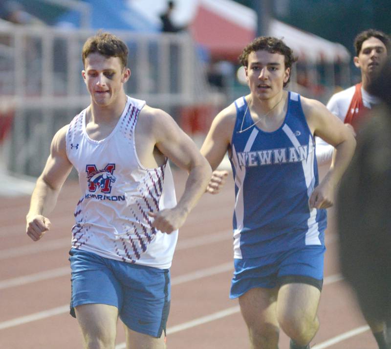 Morrison's Adam Helms (left) and Newman's Danny Welty run in the first heat of the 1600 meters at the Hawk Classic on Friday, May 2, 2025 at the Landers-Loomis Field in Oregon.