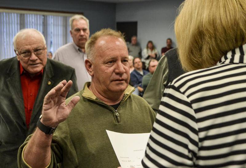 Bob Jones is sworn in as the city's next mayor on Tuesday, April 23, 2019, in Braidwood, Ill. Illinois State Police said Jones allegedly drove under the influence when he caused a three-vehicle crash on Nov. 24, 2019.