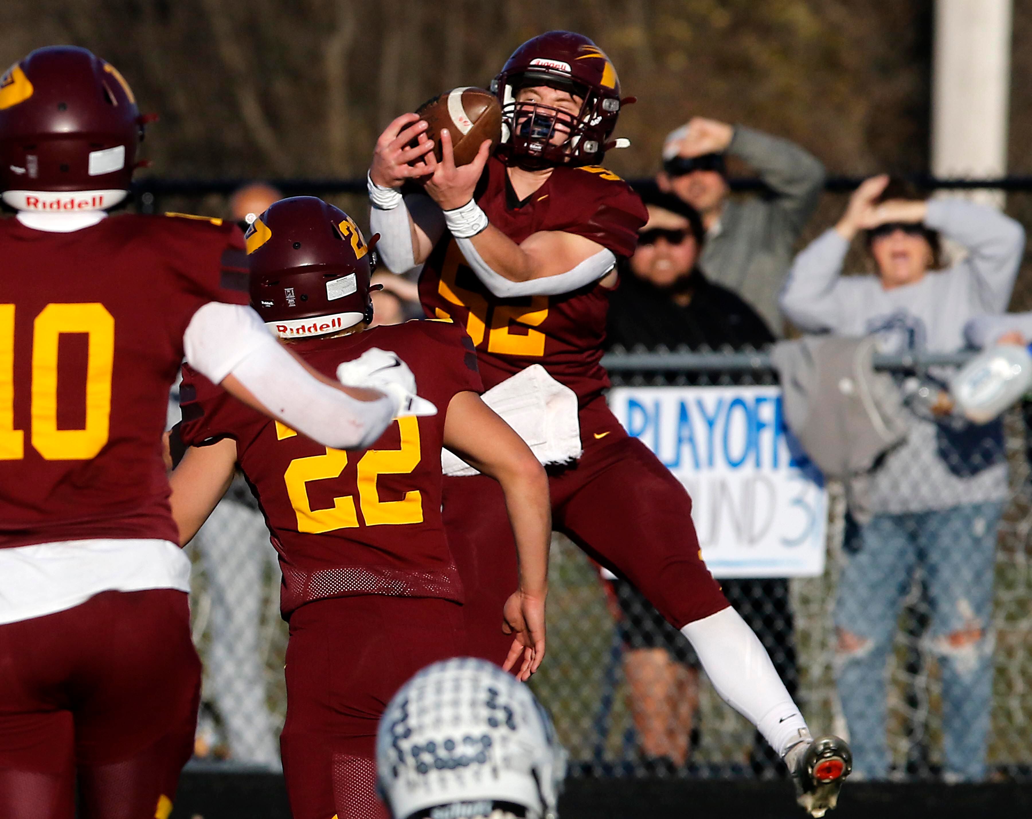 Richmond-Burton's Bryce Kowall tries to intercept a Monmouth-Roseville pass during an IHSA Class 3A quarterfinal playoff football game on Saturday, November 15, 2025, at Richmond-Burton High School, in Richmond.
