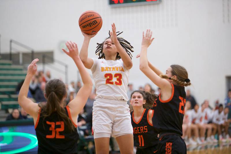 Batavia's Addie Prewitt hans a jumper against Wheaton Warrenville South at the Class 4A Regional Final on Friday, Feb.26,2024 in Bartlett.