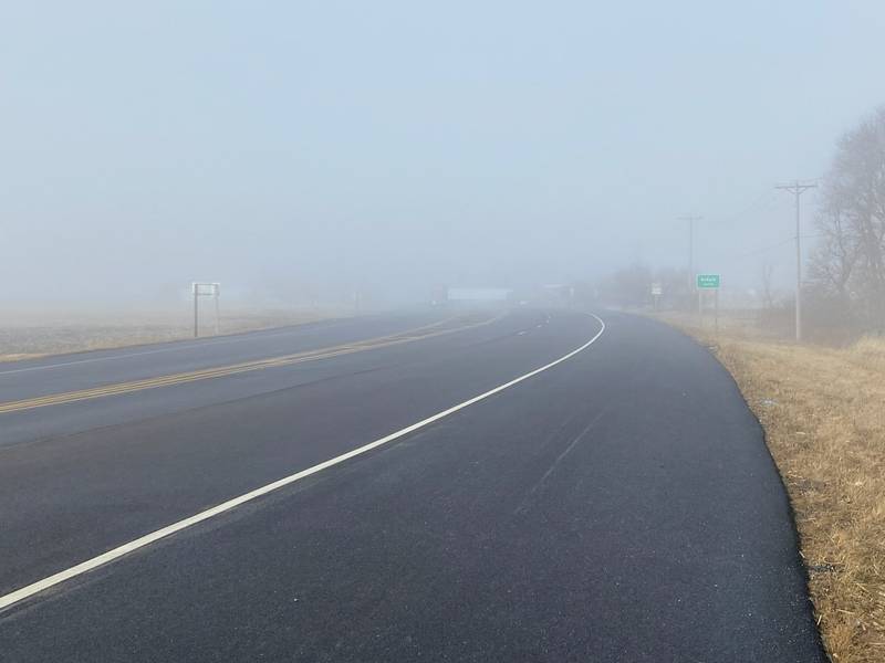 Visibility along Illinois Route 38 was limited Tuesday morning, as fog settled around DeKalb County obscuring sight for some motorists along many of the more rural roads. Seen here is Lincoln Highway headed west from Cortland into DeKalb Tuesday, Jan. 10, 2023.
