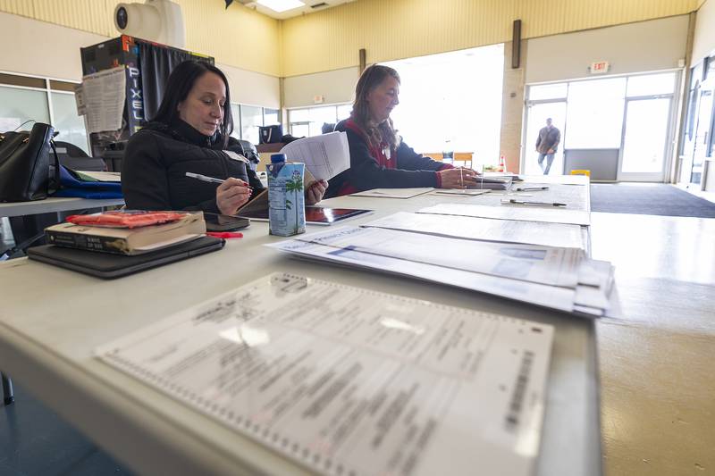 Election judges Anne Welch (left) and Lynn McCann look to stay busy Tuesday, April 1, 2025, while manning a precinct at the Northland Mall in Sterling.