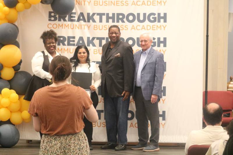 Vany Sanchez walked in a graduation ceremony held Monday, June 2, 2025, at First United Methodist Church in DeKalb. She received a diploma for her participation in Breakthrough Community Business Academy's spring 2025 cohort.