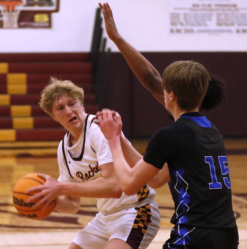 Richmond-Burton's Luke Robinson drives the lane against Woodstock's Liam Laidig during a Kishwaukee River Conference basketball game on Wednesday, Feb. 5, 2025, at Richmond-Burton High School.
