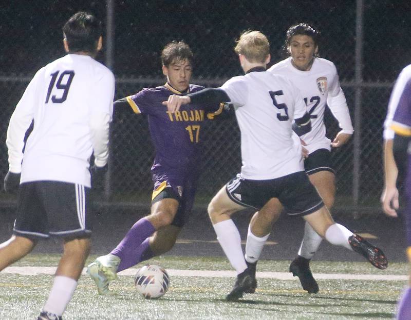 Mendota's Cesar Casas dribbles around Kewanee's Jack Coombes during the Class 1A Regional game on Wednesday Oct. 18, 2023 at Mendota High School.