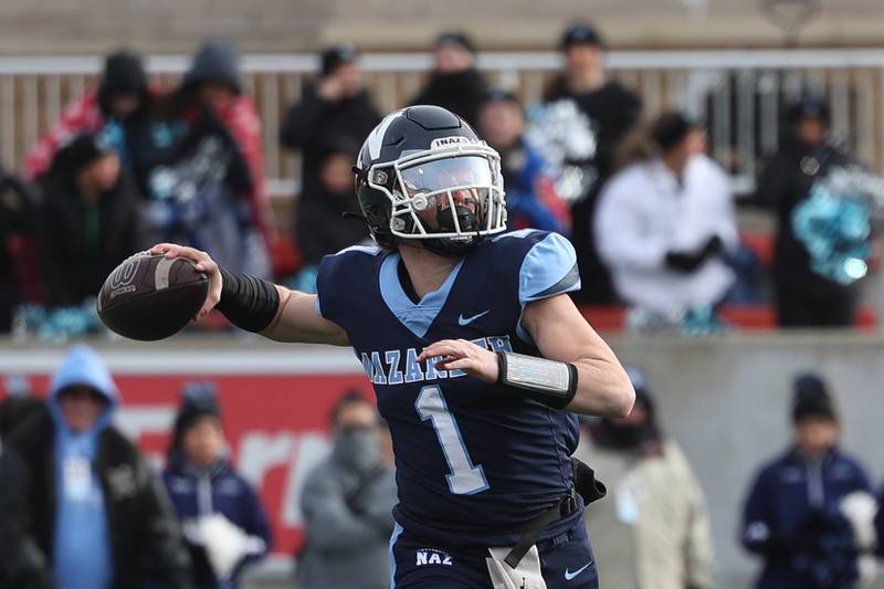 Nazareth’s Logan Malachuk looks to pass against Joliet Catholic in the Class 5A state championship on Saturday, Nov. 30, 2024 in Normal.