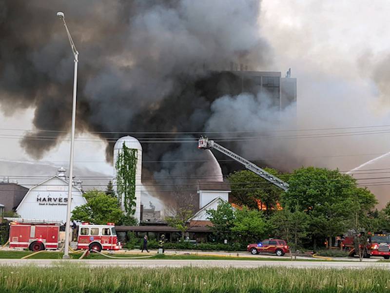 Fire engines pour water onto a structure fire at the site of the former Pheasant Run near Route 64 during a fire Saturday in St. Charles.