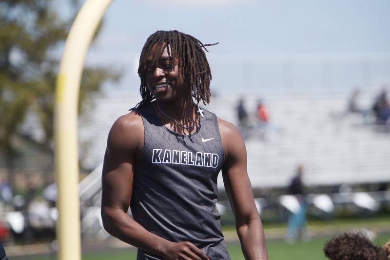 Kaneland's Fredrick Hassan is all smiles after competing in the High Jump at Kaneland's Peterson Prep invite on Saturday, April 26,2025 in Maple Park.