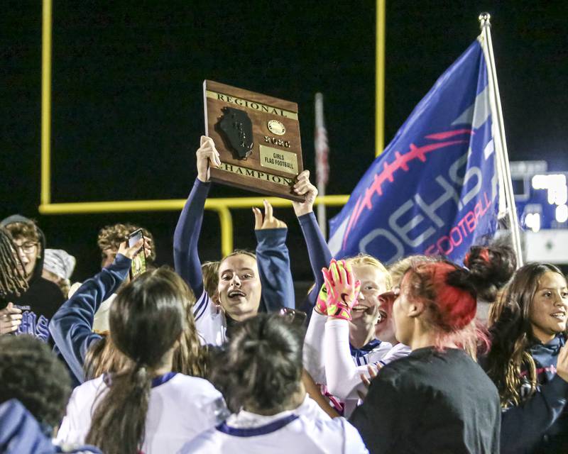 Oswego East celebrates their win over St. Charles North in their East Regional Final flag football game Thursday, Oct 9, 2025 in Oswego.