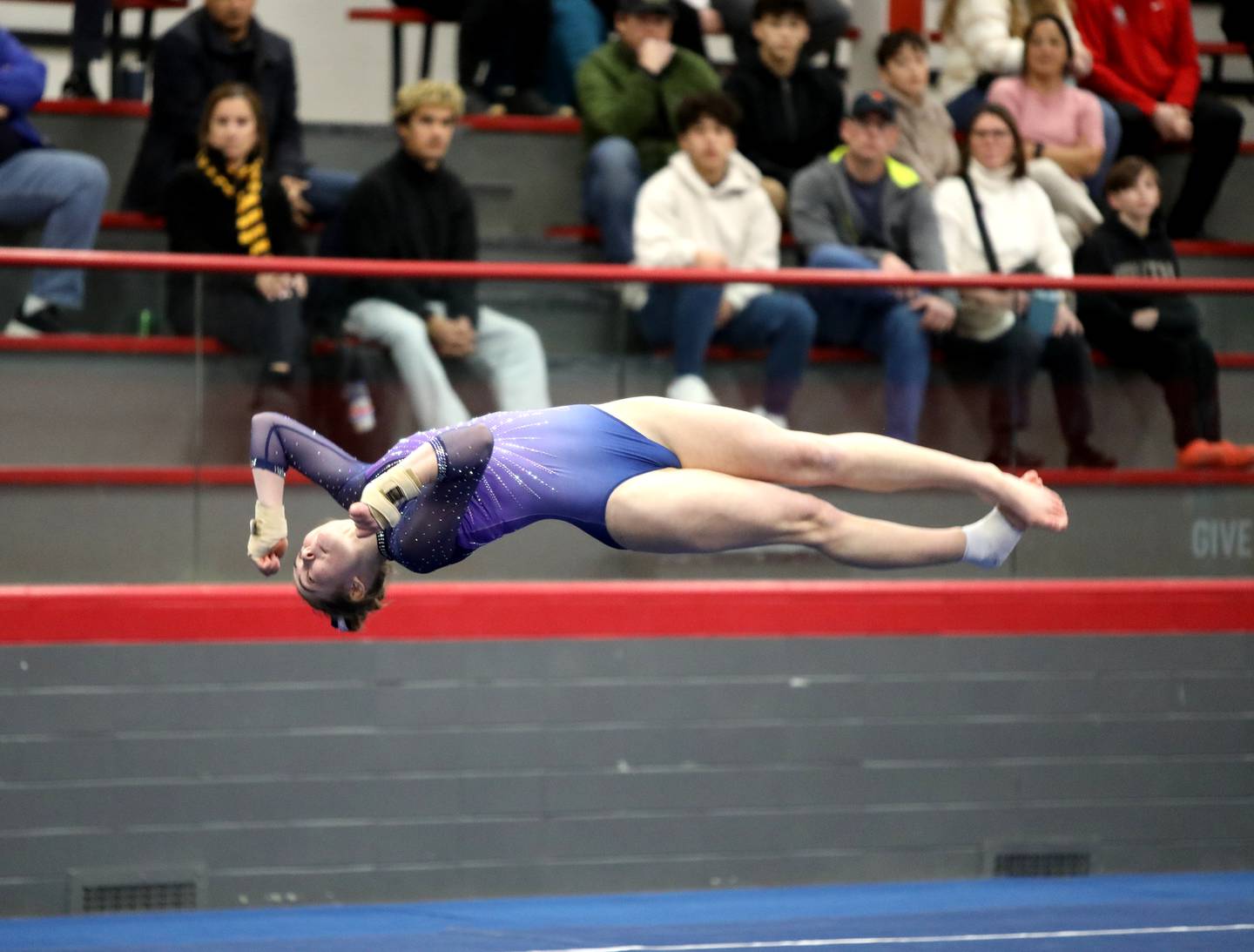 Downers Grove Co-op’s Edith Condon competes on the floor exercise during the Hinsdale Central Sectional on Monday, Feb. 10, 2025 in Hinsdale.